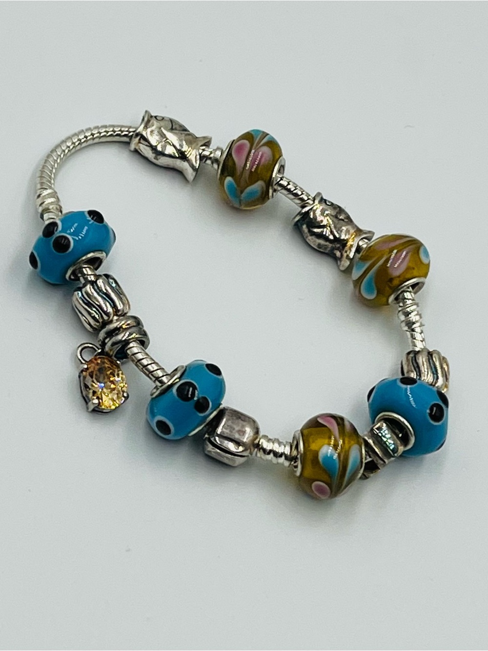 Silver Charm Bracelet with Blue and Olive Lampwork Beads